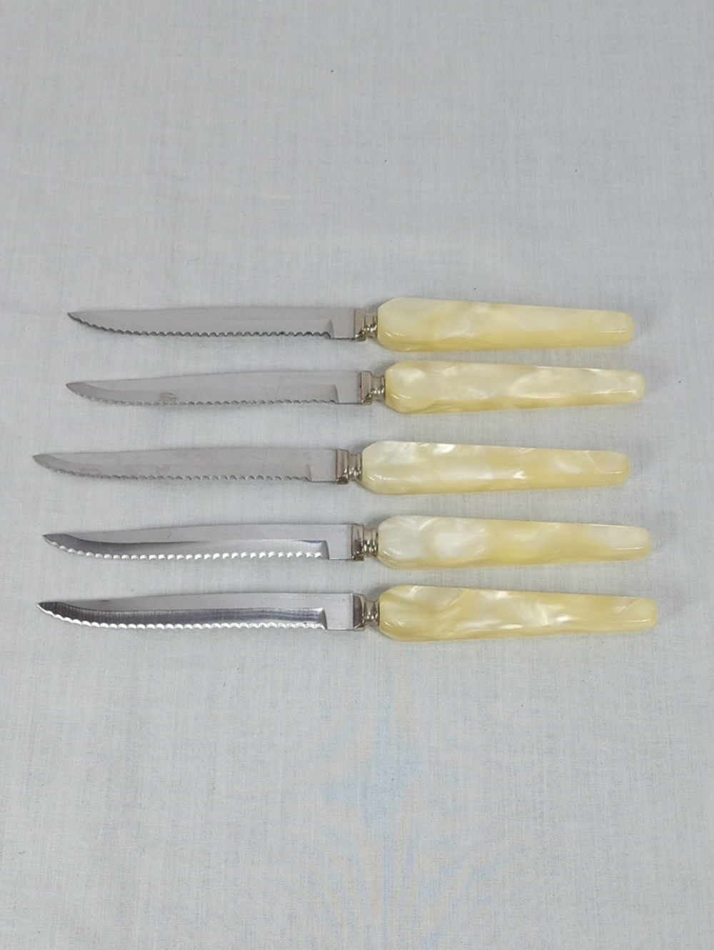 Set of 5 Forgedcraft StainlessYellow Pearlized Handle Steak Knives